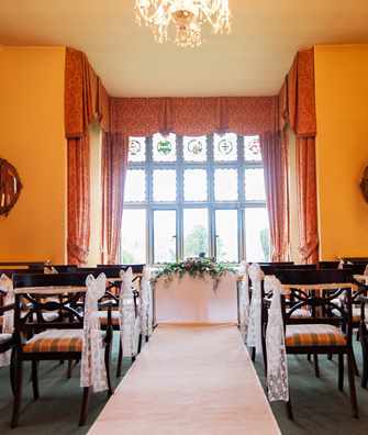 Wedding ceremony in the Dining Room at Bodysgallen Hall Wedding ceremony in the Dining Room at Bodysgallen Hall