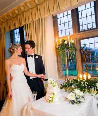 Bridal couple in the South Dining Room at Bodysgallen Hall