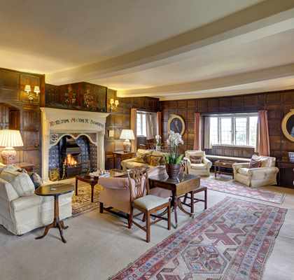 Drawing Room with fire lit at Bodysgallen Hall Drawing Room with fire lit at Bodysgallen Hall