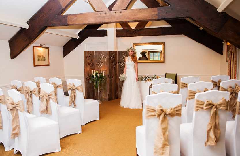 Upper Wynn Room set for wedding ceremony at Bodysgallen Hall