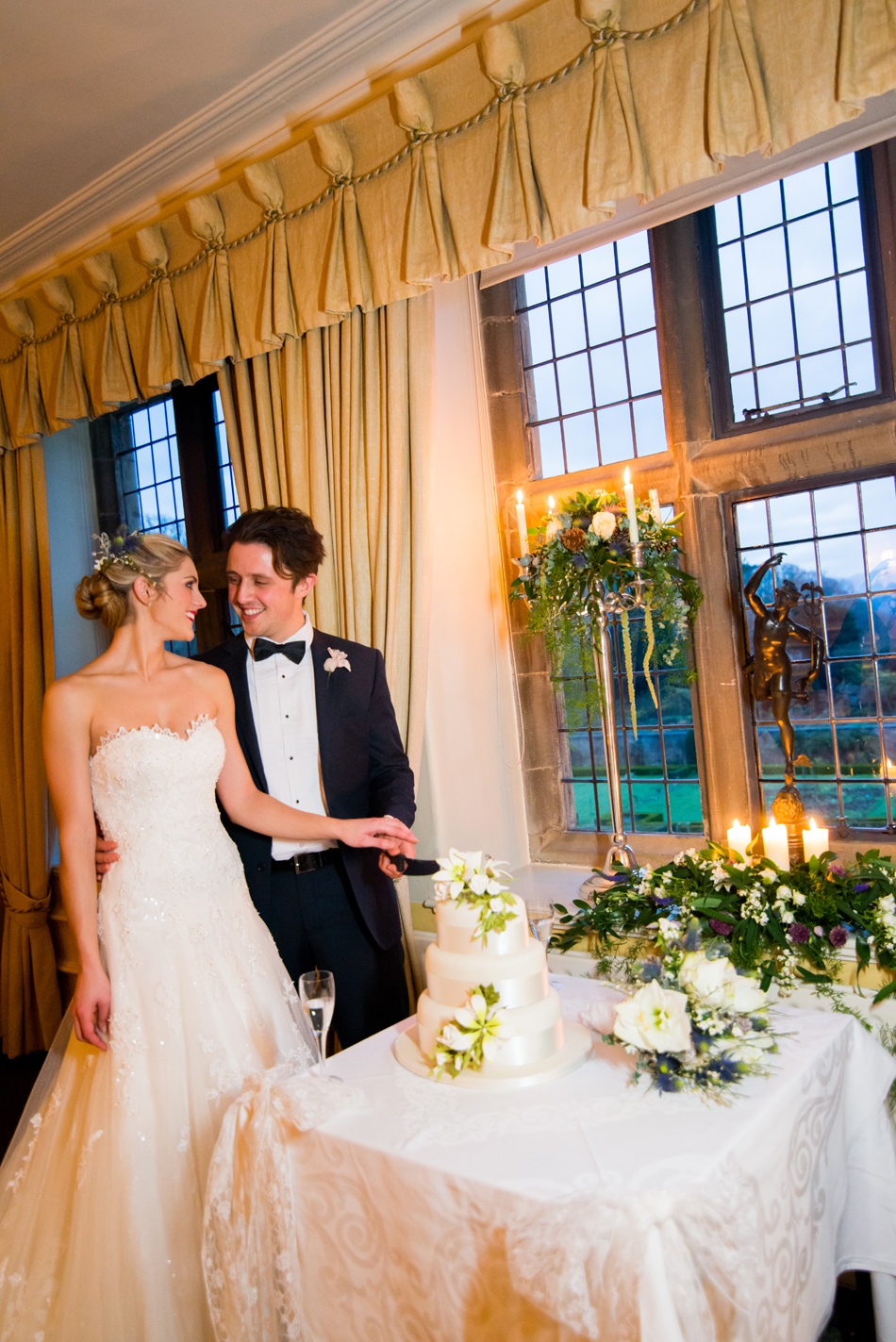 Bridal couple in the South Dining Room at Bodysgallen Hall
