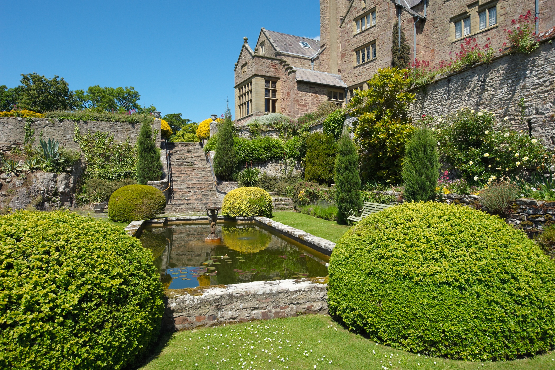 Bodysgallen Hall seen from lily pond