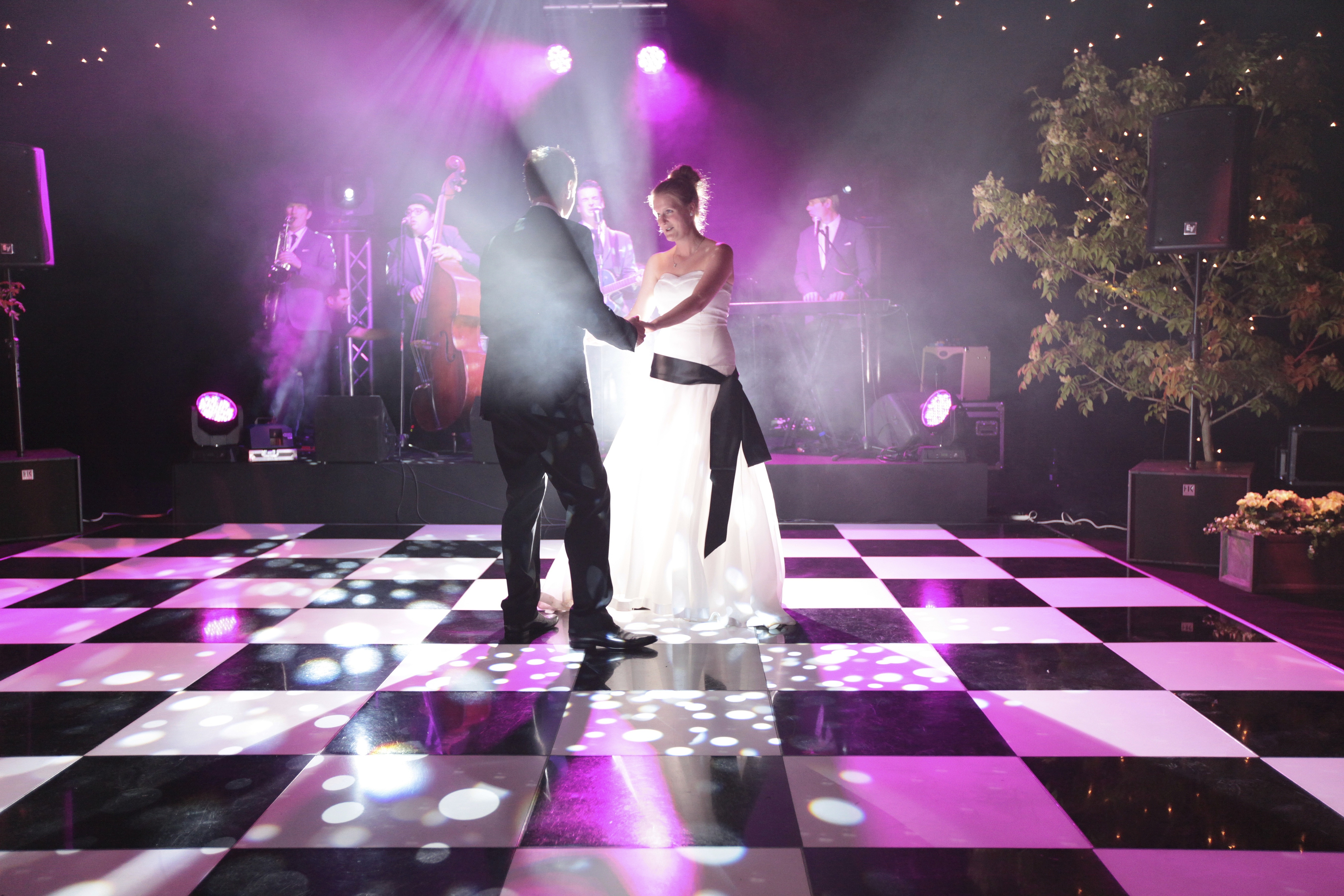 Bridal couple having first dance in wedding marquee at Bodysgallen Hall