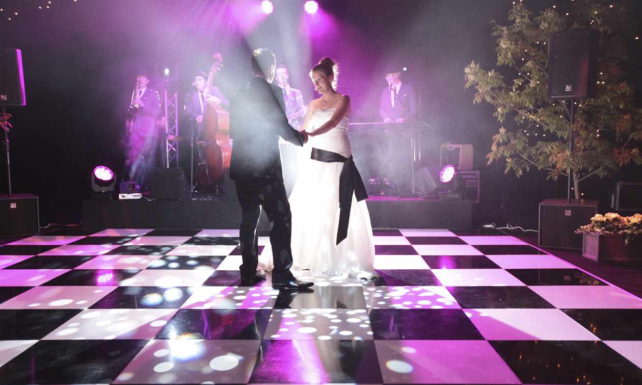 Bridal couple having first dance in wedding marquee at Bodysgallen Hall