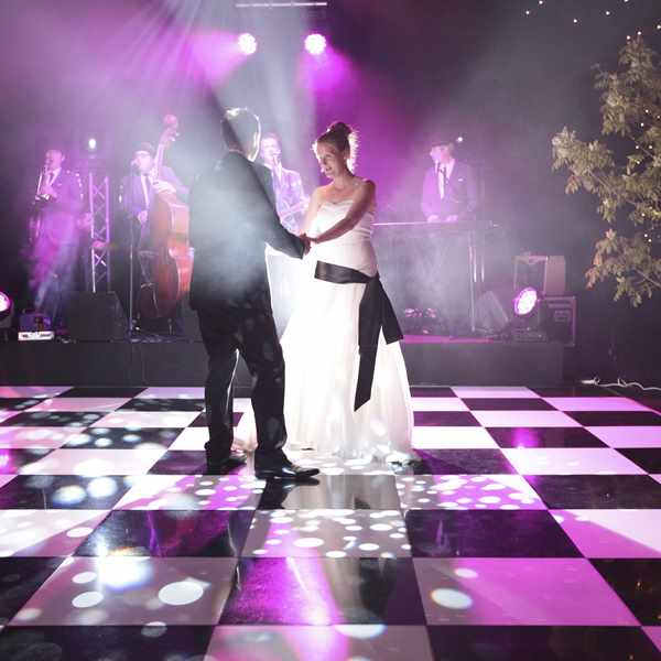 Bridal couple having first dance in wedding marquee at Bodysgallen Hall
