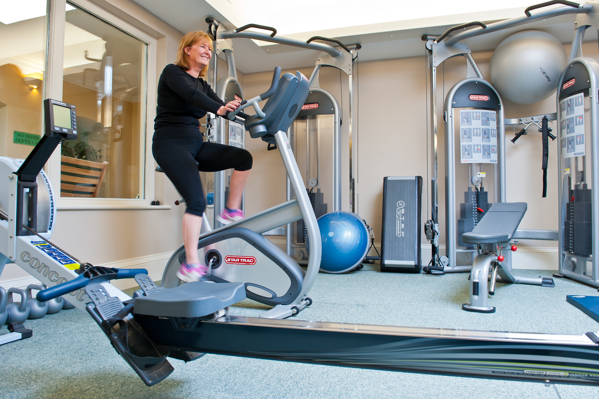 Guest exercising in the Gym at Bodysgallen Spa