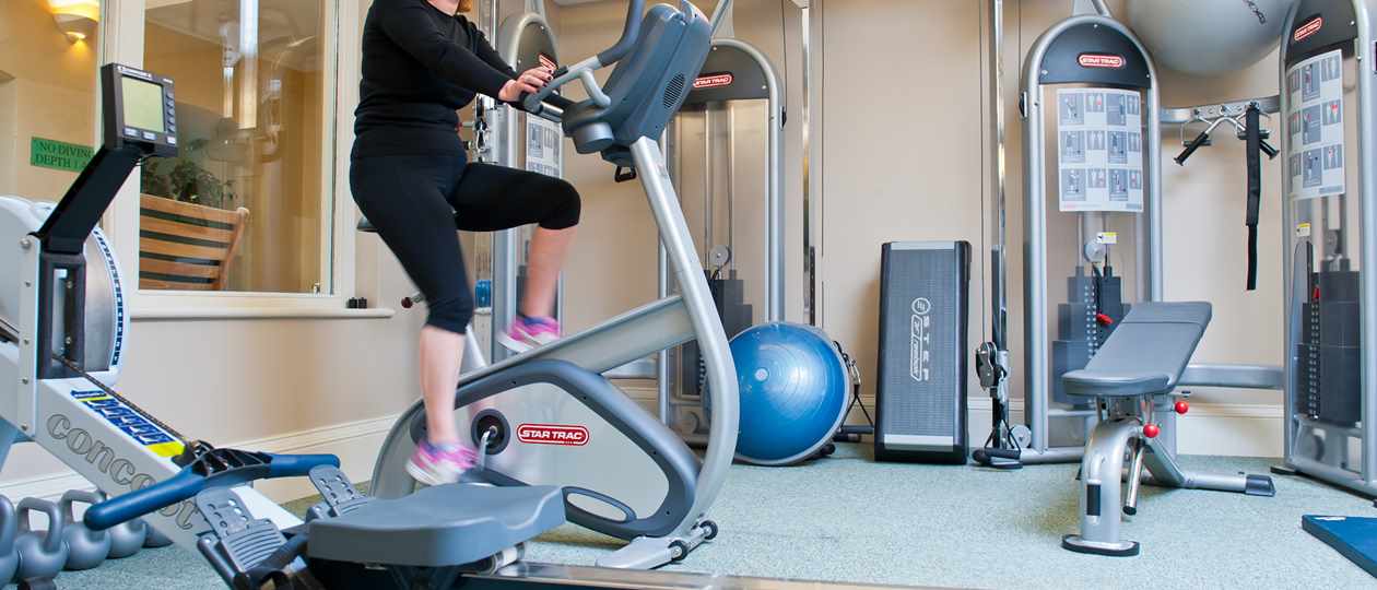 Guest exercising in the Gym at Bodysgallen Spa